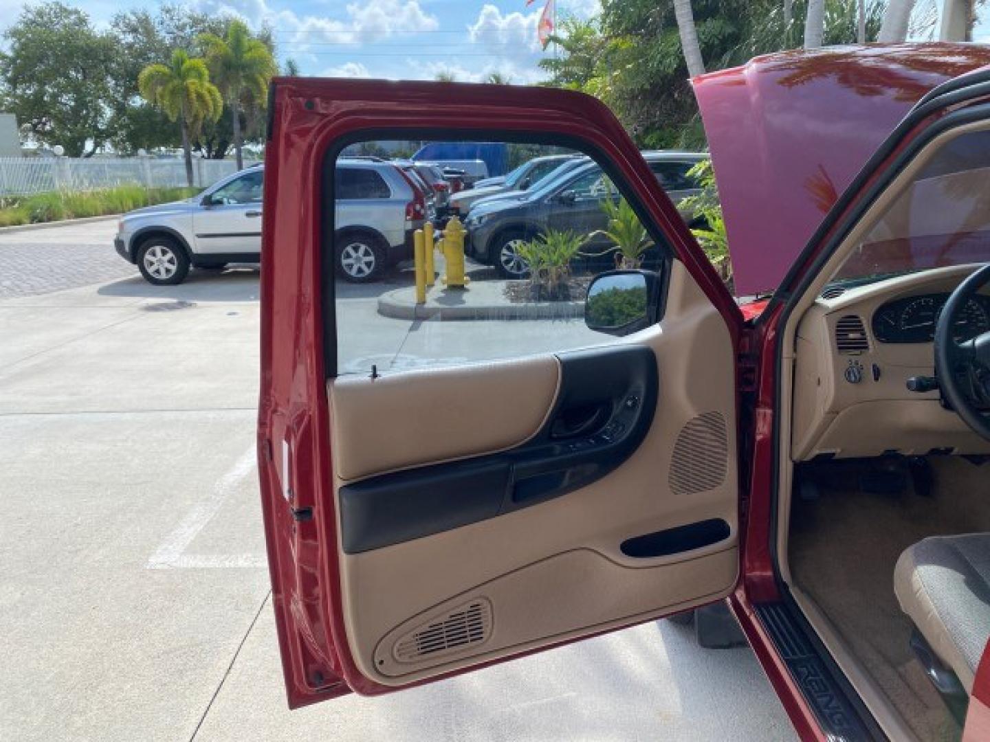 2002 Toreador Red Metallic /Med Prairie Tan Ford Ranger XLT LOW MILES 58,532 1 OWNER (1FTYR44V42P) with an 3.0L SEFI V6 Engine engine, Automatic transmission, located at 4701 North Dixie Hwy, Pompano Beach, FL, 33064, (954) 422-2889, 26.240938, -80.123474 - OUR WEBPAGE FLORIDACARS1.COM HAS OVER 100 PHOTOS AND FREE CARFAX LINK 2002 Ford Ranger XLT 1 OWNER 4 Door Extended Cab Pickup 3.0L V6 F Flex Fuel 22 MPG Rear Wheel Drive Features ABS Brakes Air Conditioning AM/FM Stereo Automatic Transmission CD Audio Cloth Seats Cruise Control Power Locks Power Mir- Photo#9