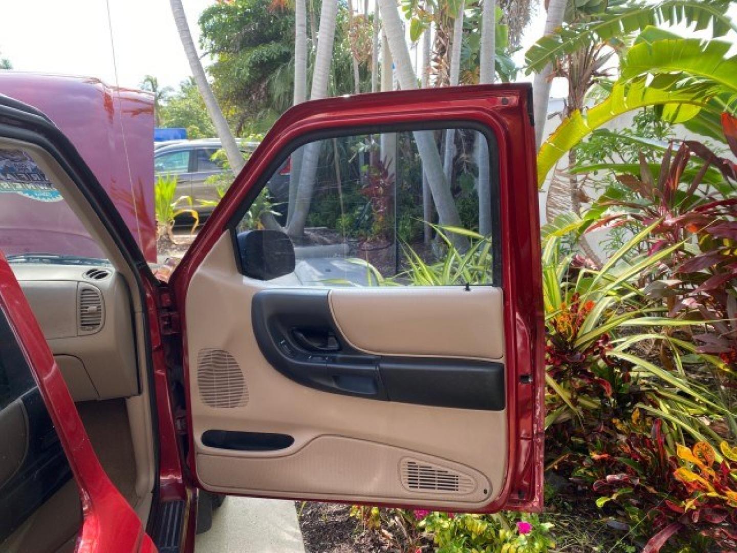 2002 Toreador Red Metallic /Med Prairie Tan Ford Ranger XLT LOW MILES 58,532 1 OWNER (1FTYR44V42P) with an 3.0L SEFI V6 Engine engine, Automatic transmission, located at 4701 North Dixie Hwy, Pompano Beach, FL, 33064, (954) 422-2889, 26.240938, -80.123474 - OUR WEBPAGE FLORIDACARS1.COM HAS OVER 100 PHOTOS AND FREE CARFAX LINK 2002 Ford Ranger XLT 1 OWNER 4 Door Extended Cab Pickup 3.0L V6 F Flex Fuel 22 MPG Rear Wheel Drive Features ABS Brakes Air Conditioning AM/FM Stereo Automatic Transmission CD Audio Cloth Seats Cruise Control Power Locks Power Mir- Photo#11