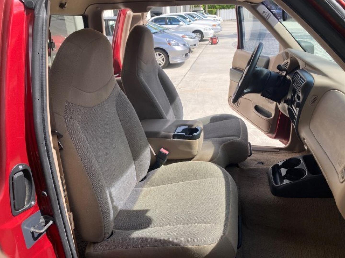 2002 Toreador Red Metallic /Med Prairie Tan Ford Ranger XLT LOW MILES 58,532 1 OWNER (1FTYR44V42P) with an 3.0L SEFI V6 Engine engine, Automatic transmission, located at 4701 North Dixie Hwy, Pompano Beach, FL, 33064, (954) 422-2889, 26.240938, -80.123474 - OUR WEBPAGE FLORIDACARS1.COM HAS OVER 100 PHOTOS AND FREE CARFAX LINK 2002 Ford Ranger XLT 1 OWNER 4 Door Extended Cab Pickup 3.0L V6 F Flex Fuel 22 MPG Rear Wheel Drive Features ABS Brakes Air Conditioning AM/FM Stereo Automatic Transmission CD Audio Cloth Seats Cruise Control Power Locks Power Mir- Photo#12