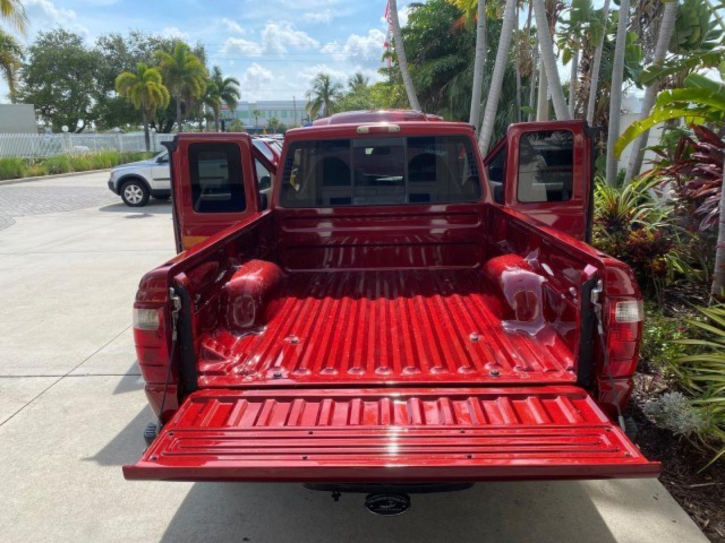 2002 Toreador Red Metallic /Med Prairie Tan Ford Ranger XLT LOW MILES 58,532 1 OWNER (1FTYR44V42P) with an 3.0L SEFI V6 Engine engine, Automatic transmission, located at 4701 North Dixie Hwy, Pompano Beach, FL, 33064, (954) 422-2889, 26.240938, -80.123474 - OUR WEBPAGE FLORIDACARS1.COM HAS OVER 100 PHOTOS AND FREE CARFAX LINK 2002 Ford Ranger XLT 1 OWNER 4 Door Extended Cab Pickup 3.0L V6 F Flex Fuel 22 MPG Rear Wheel Drive Features ABS Brakes Air Conditioning AM/FM Stereo Automatic Transmission CD Audio Cloth Seats Cruise Control Power Locks Power Mir- Photo#15