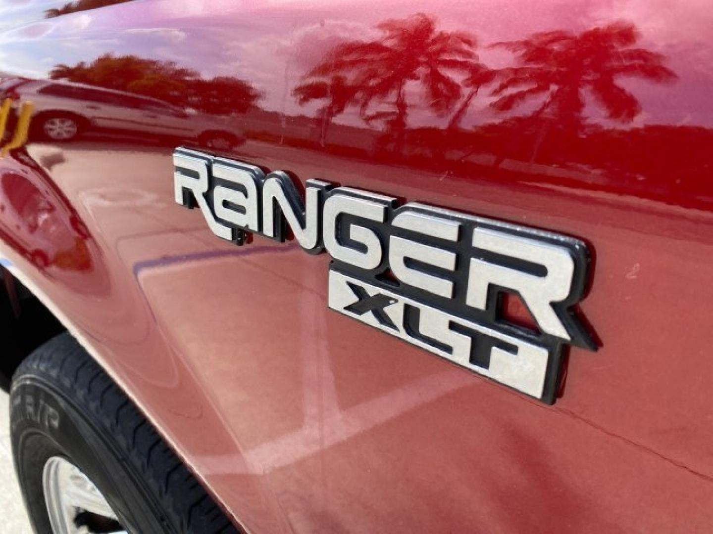 2002 Toreador Red Metallic /Med Prairie Tan Ford Ranger XLT LOW MILES 58,532 1 OWNER (1FTYR44V42P) with an 3.0L SEFI V6 Engine engine, Automatic transmission, located at 4701 North Dixie Hwy, Pompano Beach, FL, 33064, (954) 422-2889, 26.240938, -80.123474 - OUR WEBPAGE FLORIDACARS1.COM HAS OVER 100 PHOTOS AND FREE CARFAX LINK 2002 Ford Ranger XLT 1 OWNER 4 Door Extended Cab Pickup 3.0L V6 F Flex Fuel 22 MPG Rear Wheel Drive Features ABS Brakes Air Conditioning AM/FM Stereo Automatic Transmission CD Audio Cloth Seats Cruise Control Power Locks Power Mir- Photo#41