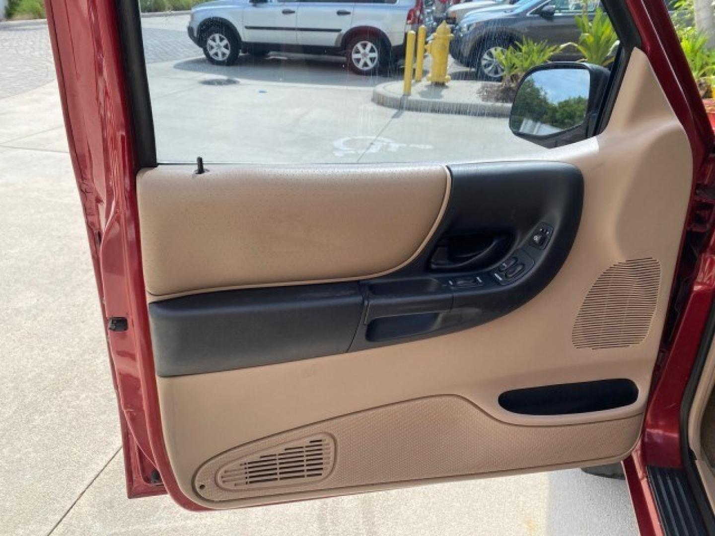 2002 Toreador Red Metallic /Med Prairie Tan Ford Ranger XLT LOW MILES 58,532 1 OWNER (1FTYR44V42P) with an 3.0L SEFI V6 Engine engine, Automatic transmission, located at 4701 North Dixie Hwy, Pompano Beach, FL, 33064, (954) 422-2889, 26.240938, -80.123474 - OUR WEBPAGE FLORIDACARS1.COM HAS OVER 100 PHOTOS AND FREE CARFAX LINK 2002 Ford Ranger XLT 1 OWNER 4 Door Extended Cab Pickup 3.0L V6 F Flex Fuel 22 MPG Rear Wheel Drive Features ABS Brakes Air Conditioning AM/FM Stereo Automatic Transmission CD Audio Cloth Seats Cruise Control Power Locks Power Mir- Photo#42