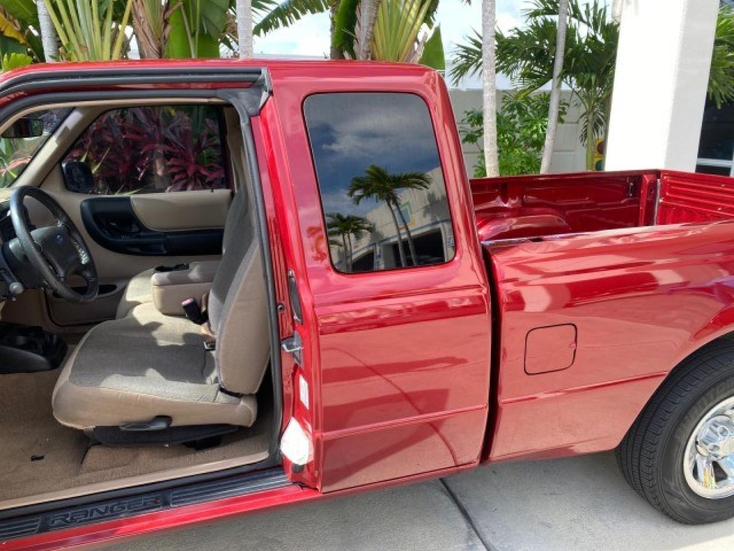 2002 Toreador Red Metallic /Med Prairie Tan Ford Ranger XLT LOW MILES 58,532 1 OWNER (1FTYR44V42P) with an 3.0L SEFI V6 Engine engine, Automatic transmission, located at 4701 North Dixie Hwy, Pompano Beach, FL, 33064, (954) 422-2889, 26.240938, -80.123474 - OUR WEBPAGE FLORIDACARS1.COM HAS OVER 100 PHOTOS AND FREE CARFAX LINK 2002 Ford Ranger XLT 1 OWNER 4 Door Extended Cab Pickup 3.0L V6 F Flex Fuel 22 MPG Rear Wheel Drive Features ABS Brakes Air Conditioning AM/FM Stereo Automatic Transmission CD Audio Cloth Seats Cruise Control Power Locks Power Mir- Photo#71
