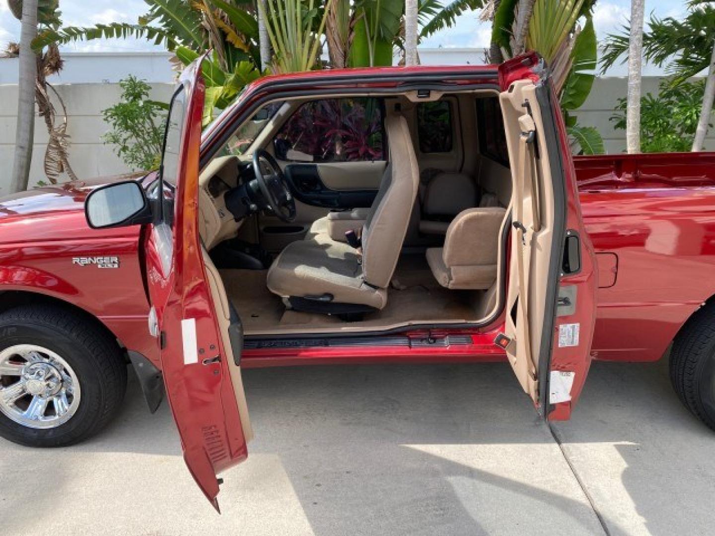 2002 Toreador Red Metallic /Med Prairie Tan Ford Ranger XLT LOW MILES 58,532 1 OWNER (1FTYR44V42P) with an 3.0L SEFI V6 Engine engine, Automatic transmission, located at 4701 North Dixie Hwy, Pompano Beach, FL, 33064, (954) 422-2889, 26.240938, -80.123474 - OUR WEBPAGE FLORIDACARS1.COM HAS OVER 100 PHOTOS AND FREE CARFAX LINK 2002 Ford Ranger XLT 1 OWNER 4 Door Extended Cab Pickup 3.0L V6 F Flex Fuel 22 MPG Rear Wheel Drive Features ABS Brakes Air Conditioning AM/FM Stereo Automatic Transmission CD Audio Cloth Seats Cruise Control Power Locks Power Mir- Photo#73