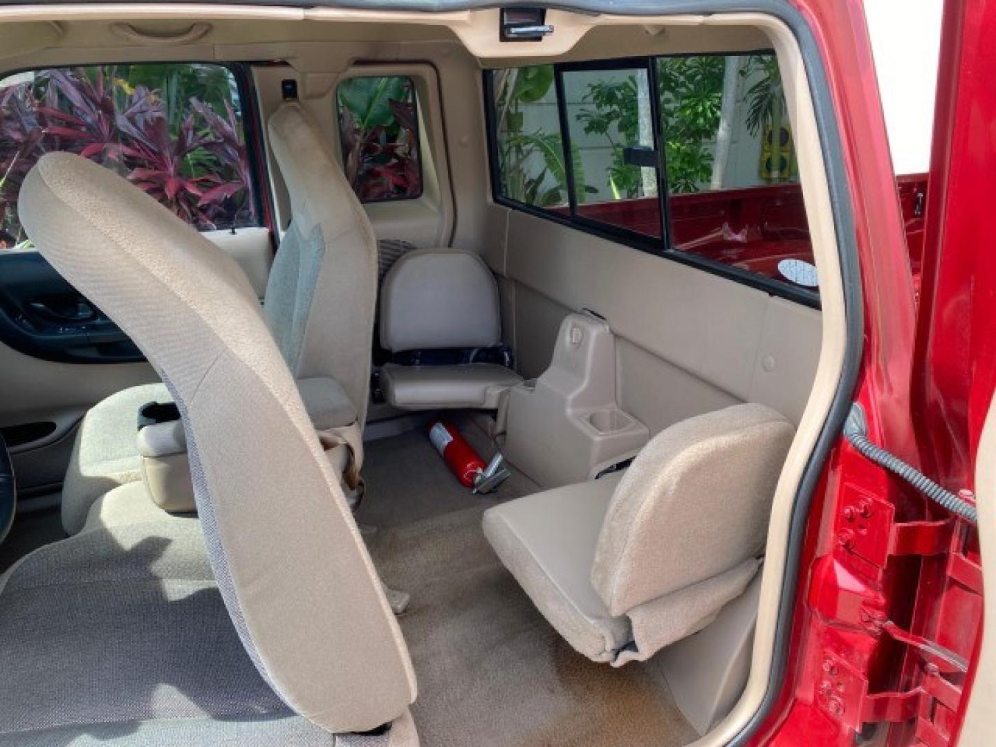 2002 Toreador Red Metallic /Med Prairie Tan Ford Ranger XLT LOW MILES 58,532 1 OWNER (1FTYR44V42P) with an 3.0L SEFI V6 Engine engine, Automatic transmission, located at 4701 North Dixie Hwy, Pompano Beach, FL, 33064, (954) 422-2889, 26.240938, -80.123474 - OUR WEBPAGE FLORIDACARS1.COM HAS OVER 100 PHOTOS AND FREE CARFAX LINK 2002 Ford Ranger XLT 1 OWNER 4 Door Extended Cab Pickup 3.0L V6 F Flex Fuel 22 MPG Rear Wheel Drive Features ABS Brakes Air Conditioning AM/FM Stereo Automatic Transmission CD Audio Cloth Seats Cruise Control Power Locks Power Mir- Photo#74