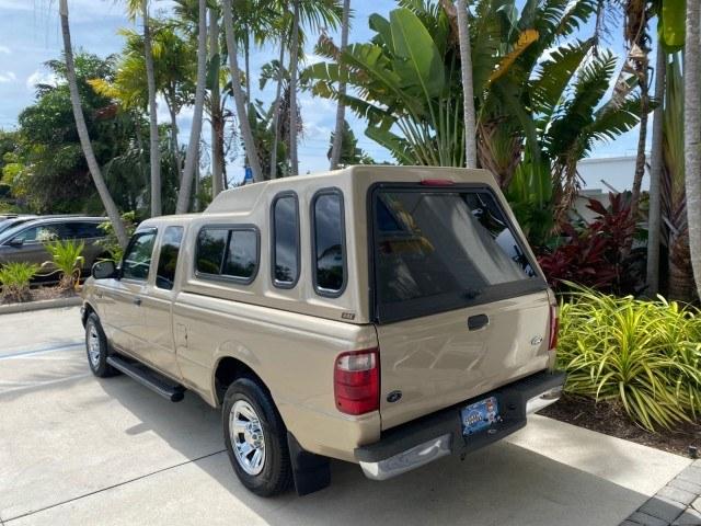 2002 Harvest Gold Metallic /Med Prairie Tan Ford Ranger XLT X CAB CAMPER TOP LOW MILES 49,062 (1FTYR44E22P) with an 4.0L SEFI SOHC V6 Engine engine, Automatic transmission, located at 4701 North Dixie Hwy, Pompano Beach, FL, 33064, (954) 422-2889, 26.240938, -80.123474 - OUR WEBPAGE FLORIDACARS1.COM HAS OVER 100 PHOTOS AND FREE CARFAX LINK 2002 Ford Ranger XLT Appearance 4 Door Extended Cab Pickup 4.0L V6 F SOHC Gasoline 23 MPG Rear Wheel Drive Features ABS Brakes Air Conditioning AM/FM Stereo Automatic Transmission Bed Liner Cassette Player CD Audio Cloth Seats Cru- Photo#5