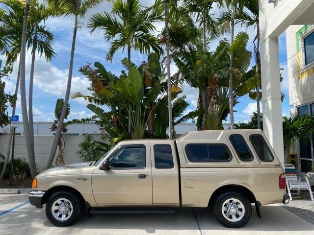 2002 Harvest Gold Metallic /Med Prairie Tan Ford Ranger XLT X CAB CAMPER TOP LOW MILES 49,062 (1FTYR44E22P) with an 4.0L SEFI SOHC V6 Engine engine, Automatic transmission, located at 4701 North Dixie Hwy, Pompano Beach, FL, 33064, (954) 422-2889, 26.240938, -80.123474 - OUR WEBPAGE FLORIDACARS1.COM HAS OVER 100 PHOTOS AND FREE CARFAX LINK 2002 Ford Ranger XLT Appearance 4 Door Extended Cab Pickup 4.0L V6 F SOHC Gasoline 23 MPG Rear Wheel Drive Features ABS Brakes Air Conditioning AM/FM Stereo Automatic Transmission Bed Liner Cassette Player CD Audio Cloth Seats Cru- Photo#30