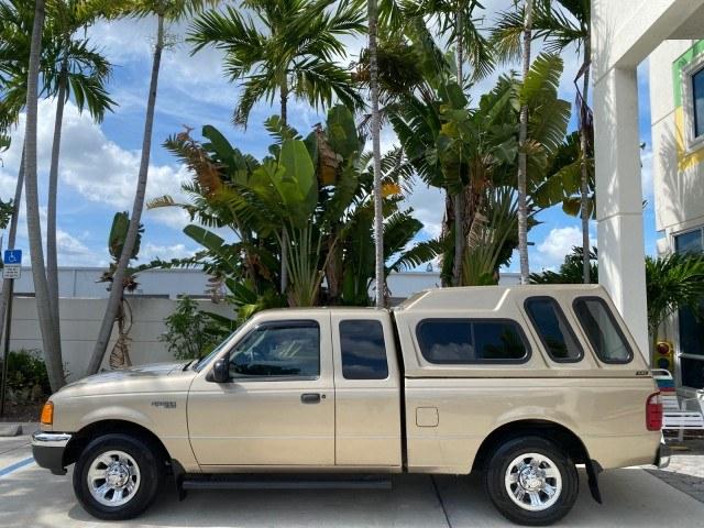 2002 Harvest Gold Metallic /Med Prairie Tan Ford Ranger XLT X CAB CAMPER TOP LOW MILES 49,062 (1FTYR44E22P) with an 4.0L SEFI SOHC V6 Engine engine, Automatic transmission, located at 4701 North Dixie Hwy, Pompano Beach, FL, 33064, (954) 422-2889, 26.240938, -80.123474 - OUR WEBPAGE FLORIDACARS1.COM HAS OVER 100 PHOTOS AND FREE CARFAX LINK 2002 Ford Ranger XLT Appearance 4 Door Extended Cab Pickup 4.0L V6 F SOHC Gasoline 23 MPG Rear Wheel Drive Features ABS Brakes Air Conditioning AM/FM Stereo Automatic Transmission Bed Liner Cassette Player CD Audio Cloth Seats Cru- Photo#31
