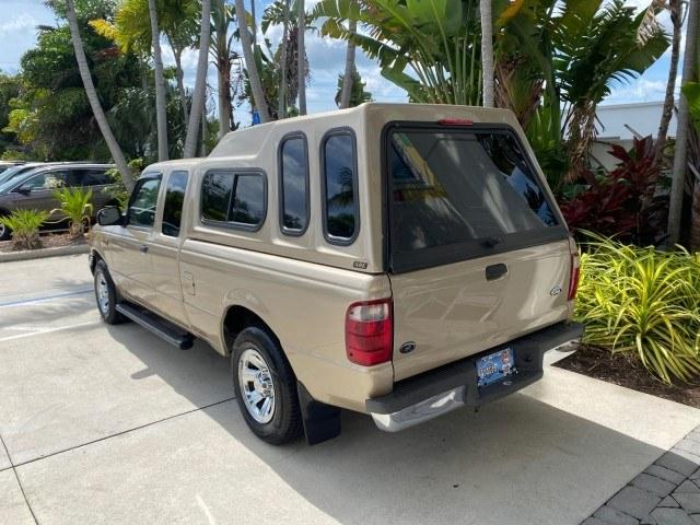 2002 Harvest Gold Metallic /Med Prairie Tan Ford Ranger XLT X CAB CAMPER TOP LOW MILES 49,062 (1FTYR44E22P) with an 4.0L SEFI SOHC V6 Engine engine, Automatic transmission, located at 4701 North Dixie Hwy, Pompano Beach, FL, 33064, (954) 422-2889, 26.240938, -80.123474 - OUR WEBPAGE FLORIDACARS1.COM HAS OVER 100 PHOTOS AND FREE CARFAX LINK 2002 Ford Ranger XLT Appearance 4 Door Extended Cab Pickup 4.0L V6 F SOHC Gasoline 23 MPG Rear Wheel Drive Features ABS Brakes Air Conditioning AM/FM Stereo Automatic Transmission Bed Liner Cassette Player CD Audio Cloth Seats Cru- Photo#32