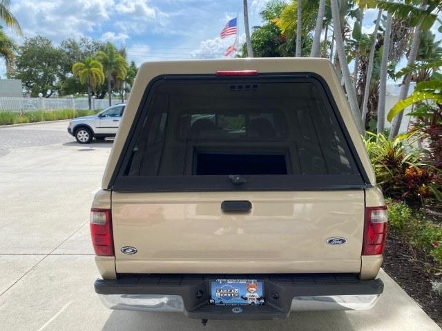 2002 Harvest Gold Metallic /Med Prairie Tan Ford Ranger XLT X CAB CAMPER TOP LOW MILES 49,062 (1FTYR44E22P) with an 4.0L SEFI SOHC V6 Engine engine, Automatic transmission, located at 4701 North Dixie Hwy, Pompano Beach, FL, 33064, (954) 422-2889, 26.240938, -80.123474 - OUR WEBPAGE FLORIDACARS1.COM HAS OVER 100 PHOTOS AND FREE CARFAX LINK 2002 Ford Ranger XLT Appearance 4 Door Extended Cab Pickup 4.0L V6 F SOHC Gasoline 23 MPG Rear Wheel Drive Features ABS Brakes Air Conditioning AM/FM Stereo Automatic Transmission Bed Liner Cassette Player CD Audio Cloth Seats Cru- Photo#35