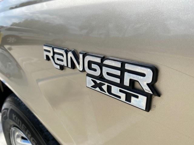 2002 Harvest Gold Metallic /Med Prairie Tan Ford Ranger XLT X CAB CAMPER TOP LOW MILES 49,062 (1FTYR44E22P) with an 4.0L SEFI SOHC V6 Engine engine, Automatic transmission, located at 4701 North Dixie Hwy, Pompano Beach, FL, 33064, (954) 422-2889, 26.240938, -80.123474 - OUR WEBPAGE FLORIDACARS1.COM HAS OVER 100 PHOTOS AND FREE CARFAX LINK 2002 Ford Ranger XLT Appearance 4 Door Extended Cab Pickup 4.0L V6 F SOHC Gasoline 23 MPG Rear Wheel Drive Features ABS Brakes Air Conditioning AM/FM Stereo Automatic Transmission Bed Liner Cassette Player CD Audio Cloth Seats Cru- Photo#41