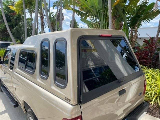2002 Harvest Gold Metallic /Med Prairie Tan Ford Ranger XLT X CAB CAMPER TOP LOW MILES 49,062 (1FTYR44E22P) with an 4.0L SEFI SOHC V6 Engine engine, Automatic transmission, located at 4701 North Dixie Hwy, Pompano Beach, FL, 33064, (954) 422-2889, 26.240938, -80.123474 - OUR WEBPAGE FLORIDACARS1.COM HAS OVER 100 PHOTOS AND FREE CARFAX LINK 2002 Ford Ranger XLT Appearance 4 Door Extended Cab Pickup 4.0L V6 F SOHC Gasoline 23 MPG Rear Wheel Drive Features ABS Brakes Air Conditioning AM/FM Stereo Automatic Transmission Bed Liner Cassette Player CD Audio Cloth Seats Cru- Photo#85