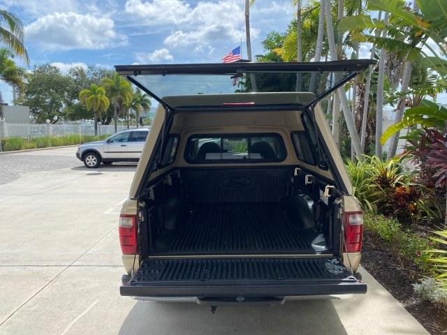 2002 Harvest Gold Metallic /Med Prairie Tan Ford Ranger XLT X CAB CAMPER TOP LOW MILES 49,062 (1FTYR44E22P) with an 4.0L SEFI SOHC V6 Engine engine, Automatic transmission, located at 4701 North Dixie Hwy, Pompano Beach, FL, 33064, (954) 422-2889, 26.240938, -80.123474 - OUR WEBPAGE FLORIDACARS1.COM HAS OVER 100 PHOTOS AND FREE CARFAX LINK 2002 Ford Ranger XLT Appearance 4 Door Extended Cab Pickup 4.0L V6 F SOHC Gasoline 23 MPG Rear Wheel Drive Features ABS Brakes Air Conditioning AM/FM Stereo Automatic Transmission Bed Liner Cassette Player CD Audio Cloth Seats Cru- Photo#88