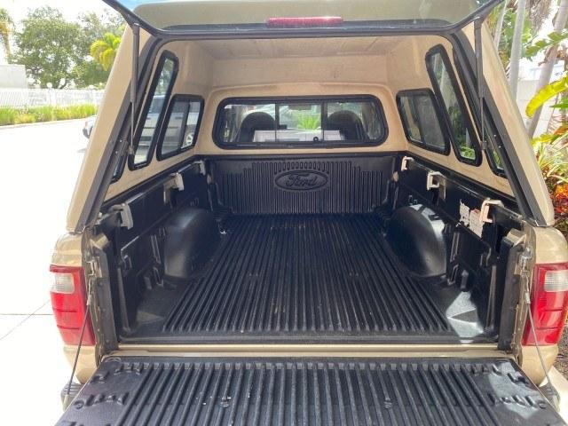 2002 Harvest Gold Metallic /Med Prairie Tan Ford Ranger XLT X CAB CAMPER TOP LOW MILES 49,062 (1FTYR44E22P) with an 4.0L SEFI SOHC V6 Engine engine, Automatic transmission, located at 4701 North Dixie Hwy, Pompano Beach, FL, 33064, (954) 422-2889, 26.240938, -80.123474 - OUR WEBPAGE FLORIDACARS1.COM HAS OVER 100 PHOTOS AND FREE CARFAX LINK 2002 Ford Ranger XLT Appearance 4 Door Extended Cab Pickup 4.0L V6 F SOHC Gasoline 23 MPG Rear Wheel Drive Features ABS Brakes Air Conditioning AM/FM Stereo Automatic Transmission Bed Liner Cassette Player CD Audio Cloth Seats Cru- Photo#89
