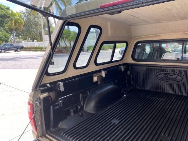 2002 Harvest Gold Metallic /Med Prairie Tan Ford Ranger XLT X CAB CAMPER TOP LOW MILES 49,062 (1FTYR44E22P) with an 4.0L SEFI SOHC V6 Engine engine, Automatic transmission, located at 4701 North Dixie Hwy, Pompano Beach, FL, 33064, (954) 422-2889, 26.240938, -80.123474 - OUR WEBPAGE FLORIDACARS1.COM HAS OVER 100 PHOTOS AND FREE CARFAX LINK 2002 Ford Ranger XLT Appearance 4 Door Extended Cab Pickup 4.0L V6 F SOHC Gasoline 23 MPG Rear Wheel Drive Features ABS Brakes Air Conditioning AM/FM Stereo Automatic Transmission Bed Liner Cassette Player CD Audio Cloth Seats Cru- Photo#92