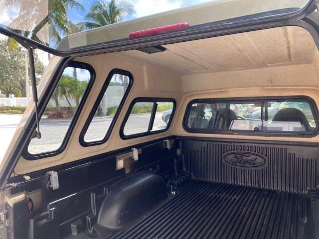 2002 Harvest Gold Metallic /Med Prairie Tan Ford Ranger XLT X CAB CAMPER TOP LOW MILES 49,062 (1FTYR44E22P) with an 4.0L SEFI SOHC V6 Engine engine, Automatic transmission, located at 4701 North Dixie Hwy, Pompano Beach, FL, 33064, (954) 422-2889, 26.240938, -80.123474 - OUR WEBPAGE FLORIDACARS1.COM HAS OVER 100 PHOTOS AND FREE CARFAX LINK 2002 Ford Ranger XLT Appearance 4 Door Extended Cab Pickup 4.0L V6 F SOHC Gasoline 23 MPG Rear Wheel Drive Features ABS Brakes Air Conditioning AM/FM Stereo Automatic Transmission Bed Liner Cassette Player CD Audio Cloth Seats Cru- Photo#93