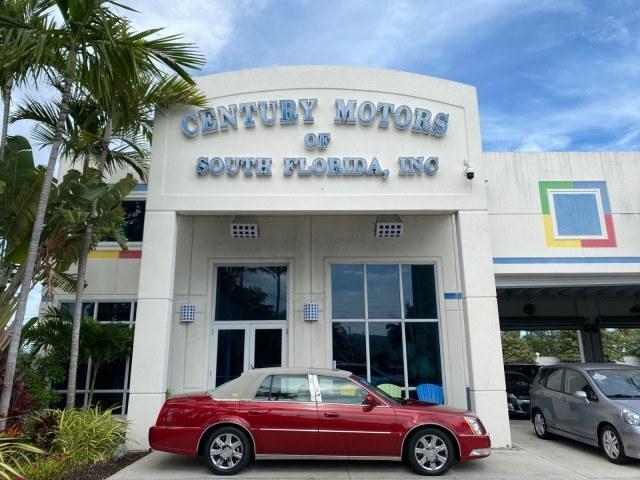 2006 Crimson Pearl /Shale Cadillac DTS w/1SC LOW MILES 49863 SUNROOF PEARL RED (1G6KD57Y26U) with an 4.6L DOHC V8 Northstar Engine engine, Automatic transmission, located at 4701 North Dixie Hwy, Pompano Beach, FL, 33064, (954) 422-2889, 26.240938, -80.123474 - OUR WEBPAGE FLORIDACARS1.COM HAS OVER 100 PHOTOS AND FREE CARFAX LINK 2006 Cadillac DTS Luxury Sedan 4 DR 4.6L V8 F Gasoline 25 MPG Front Wheel Drive Features A/C Seat(s) ABS Brakes Air Conditioning Alloy Wheels AM/FM Stereo Automatic Transmission Auxiliary Audio Input Bluetooth Technology CD Audio- Photo#0