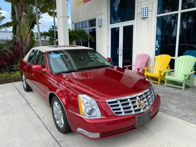 2006 Crimson Pearl /Shale Cadillac DTS w/1SC LOW MILES 49863 SUNROOF PEARL RED (1G6KD57Y26U) with an 4.6L DOHC V8 Northstar Engine engine, Automatic transmission, located at 4701 North Dixie Hwy, Pompano Beach, FL, 33064, (954) 422-2889, 26.240938, -80.123474 - OUR WEBPAGE FLORIDACARS1.COM HAS OVER 100 PHOTOS AND FREE CARFAX LINK 2006 Cadillac DTS Luxury Sedan 4 DR 4.6L V8 F Gasoline 25 MPG Front Wheel Drive Features A/C Seat(s) ABS Brakes Air Conditioning Alloy Wheels AM/FM Stereo Automatic Transmission Auxiliary Audio Input Bluetooth Technology CD Audio- Photo#1