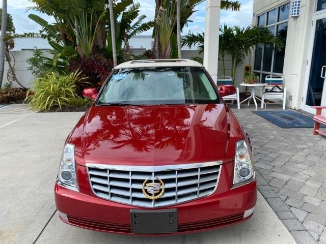 2006 Crimson Pearl /Shale Cadillac DTS w/1SC LOW MILES 49863 SUNROOF PEARL RED (1G6KD57Y26U) with an 4.6L DOHC V8 Northstar Engine engine, Automatic transmission, located at 4701 North Dixie Hwy, Pompano Beach, FL, 33064, (954) 422-2889, 26.240938, -80.123474 - OUR WEBPAGE FLORIDACARS1.COM HAS OVER 100 PHOTOS AND FREE CARFAX LINK 2006 Cadillac DTS Luxury Sedan 4 DR 4.6L V8 F Gasoline 25 MPG Front Wheel Drive Features A/C Seat(s) ABS Brakes Air Conditioning Alloy Wheels AM/FM Stereo Automatic Transmission Auxiliary Audio Input Bluetooth Technology CD Audio- Photo#2