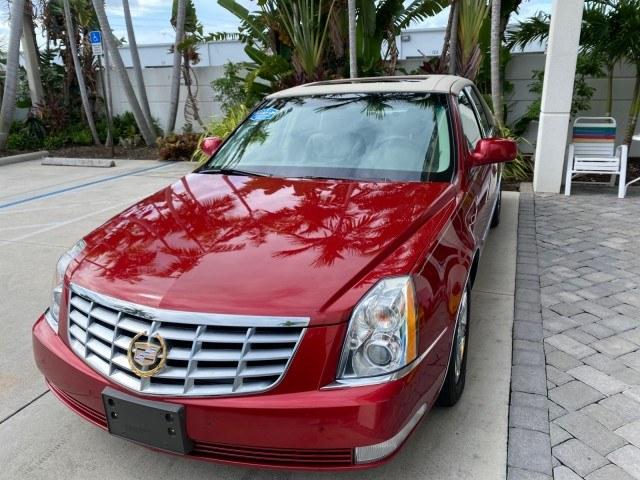 2006 Crimson Pearl /Shale Cadillac DTS w/1SC LOW MILES 49863 SUNROOF PEARL RED (1G6KD57Y26U) with an 4.6L DOHC V8 Northstar Engine engine, Automatic transmission, located at 4701 North Dixie Hwy, Pompano Beach, FL, 33064, (954) 422-2889, 26.240938, -80.123474 - OUR WEBPAGE FLORIDACARS1.COM HAS OVER 100 PHOTOS AND FREE CARFAX LINK 2006 Cadillac DTS Luxury Sedan 4 DR 4.6L V8 F Gasoline 25 MPG Front Wheel Drive Features A/C Seat(s) ABS Brakes Air Conditioning Alloy Wheels AM/FM Stereo Automatic Transmission Auxiliary Audio Input Bluetooth Technology CD Audio- Photo#3