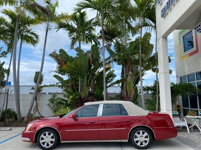2006 Crimson Pearl /Shale Cadillac DTS w/1SC LOW MILES 49863 SUNROOF PEARL RED (1G6KD57Y26U) with an 4.6L DOHC V8 Northstar Engine engine, Automatic transmission, located at 4701 North Dixie Hwy, Pompano Beach, FL, 33064, (954) 422-2889, 26.240938, -80.123474 - OUR WEBPAGE FLORIDACARS1.COM HAS OVER 100 PHOTOS AND FREE CARFAX LINK 2006 Cadillac DTS Luxury Sedan 4 DR 4.6L V8 F Gasoline 25 MPG Front Wheel Drive Features A/C Seat(s) ABS Brakes Air Conditioning Alloy Wheels AM/FM Stereo Automatic Transmission Auxiliary Audio Input Bluetooth Technology CD Audio- Photo#4