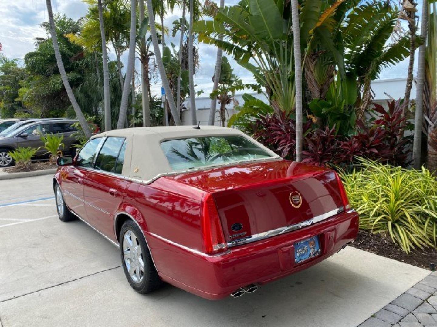 2006 Crimson Pearl /Shale Cadillac DTS w/1SC LOW MILES 49863 SUNROOF PEARL RED (1G6KD57Y26U) with an 4.6L DOHC V8 Northstar Engine engine, Automatic transmission, located at 4701 North Dixie Hwy, Pompano Beach, FL, 33064, (954) 422-2889, 26.240938, -80.123474 - OUR WEBPAGE FLORIDACARS1.COM HAS OVER 100 PHOTOS AND FREE CARFAX LINK 2006 Cadillac DTS Luxury Sedan 4 DR 4.6L V8 F Gasoline 25 MPG Front Wheel Drive Features A/C Seat(s) ABS Brakes Air Conditioning Alloy Wheels AM/FM Stereo Automatic Transmission Auxiliary Audio Input Bluetooth Technology CD Audio- Photo#5
