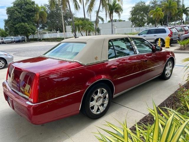2006 Crimson Pearl /Shale Cadillac DTS w/1SC LOW MILES 49863 SUNROOF PEARL RED (1G6KD57Y26U) with an 4.6L DOHC V8 Northstar Engine engine, Automatic transmission, located at 4701 North Dixie Hwy, Pompano Beach, FL, 33064, (954) 422-2889, 26.240938, -80.123474 - OUR WEBPAGE FLORIDACARS1.COM HAS OVER 100 PHOTOS AND FREE CARFAX LINK 2006 Cadillac DTS Luxury Sedan 4 DR 4.6L V8 F Gasoline 25 MPG Front Wheel Drive Features A/C Seat(s) ABS Brakes Air Conditioning Alloy Wheels AM/FM Stereo Automatic Transmission Auxiliary Audio Input Bluetooth Technology CD Audio- Photo#7