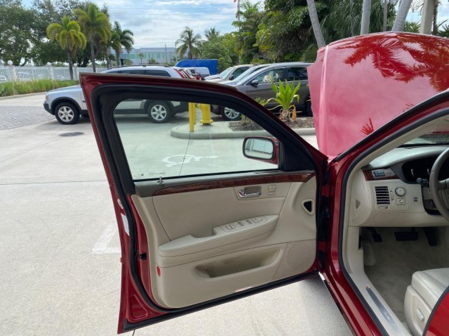 2006 Crimson Pearl /Shale Cadillac DTS w/1SC LOW MILES 49863 SUNROOF PEARL RED (1G6KD57Y26U) with an 4.6L DOHC V8 Northstar Engine engine, Automatic transmission, located at 4701 North Dixie Hwy, Pompano Beach, FL, 33064, (954) 422-2889, 26.240938, -80.123474 - OUR WEBPAGE FLORIDACARS1.COM HAS OVER 100 PHOTOS AND FREE CARFAX LINK 2006 Cadillac DTS Luxury Sedan 4 DR 4.6L V8 F Gasoline 25 MPG Front Wheel Drive Features A/C Seat(s) ABS Brakes Air Conditioning Alloy Wheels AM/FM Stereo Automatic Transmission Auxiliary Audio Input Bluetooth Technology CD Audio- Photo#9