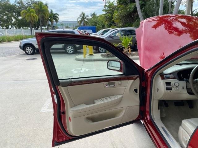 2006 Crimson Pearl /Shale Cadillac DTS w/1SC LOW MILES 49863 SUNROOF PEARL RED (1G6KD57Y26U) with an 4.6L DOHC V8 Northstar Engine engine, Automatic transmission, located at 4701 North Dixie Hwy, Pompano Beach, FL, 33064, (954) 422-2889, 26.240938, -80.123474 - OUR WEBPAGE FLORIDACARS1.COM HAS OVER 100 PHOTOS AND FREE CARFAX LINK 2006 Cadillac DTS Luxury Sedan 4 DR 4.6L V8 F Gasoline 25 MPG Front Wheel Drive Features A/C Seat(s) ABS Brakes Air Conditioning Alloy Wheels AM/FM Stereo Automatic Transmission Auxiliary Audio Input Bluetooth Technology CD Audio- Photo#9