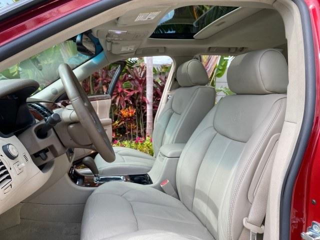 2006 Crimson Pearl /Shale Cadillac DTS w/1SC LOW MILES 49863 SUNROOF PEARL RED (1G6KD57Y26U) with an 4.6L DOHC V8 Northstar Engine engine, Automatic transmission, located at 4701 North Dixie Hwy, Pompano Beach, FL, 33064, (954) 422-2889, 26.240938, -80.123474 - OUR WEBPAGE FLORIDACARS1.COM HAS OVER 100 PHOTOS AND FREE CARFAX LINK 2006 Cadillac DTS Luxury Sedan 4 DR 4.6L V8 F Gasoline 25 MPG Front Wheel Drive Features A/C Seat(s) ABS Brakes Air Conditioning Alloy Wheels AM/FM Stereo Automatic Transmission Auxiliary Audio Input Bluetooth Technology CD Audio- Photo#10