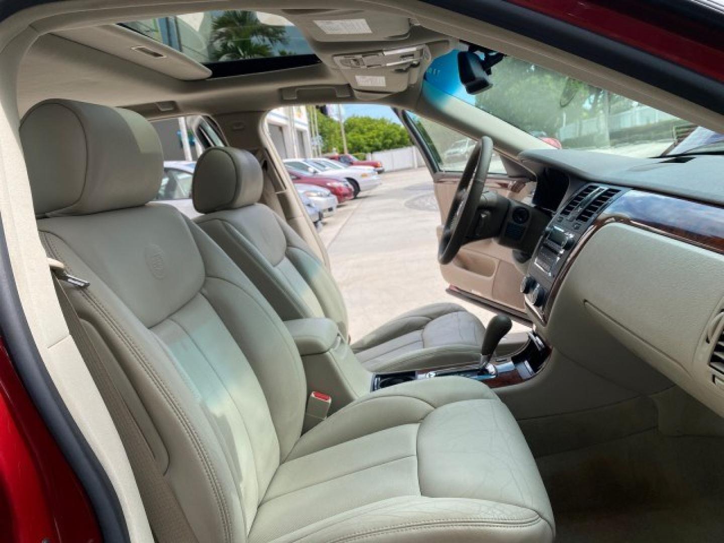2006 Crimson Pearl /Shale Cadillac DTS w/1SC LOW MILES 49863 SUNROOF PEARL RED (1G6KD57Y26U) with an 4.6L DOHC V8 Northstar Engine engine, Automatic transmission, located at 4701 North Dixie Hwy, Pompano Beach, FL, 33064, (954) 422-2889, 26.240938, -80.123474 - OUR WEBPAGE FLORIDACARS1.COM HAS OVER 100 PHOTOS AND FREE CARFAX LINK 2006 Cadillac DTS Luxury Sedan 4 DR 4.6L V8 F Gasoline 25 MPG Front Wheel Drive Features A/C Seat(s) ABS Brakes Air Conditioning Alloy Wheels AM/FM Stereo Automatic Transmission Auxiliary Audio Input Bluetooth Technology CD Audio- Photo#12