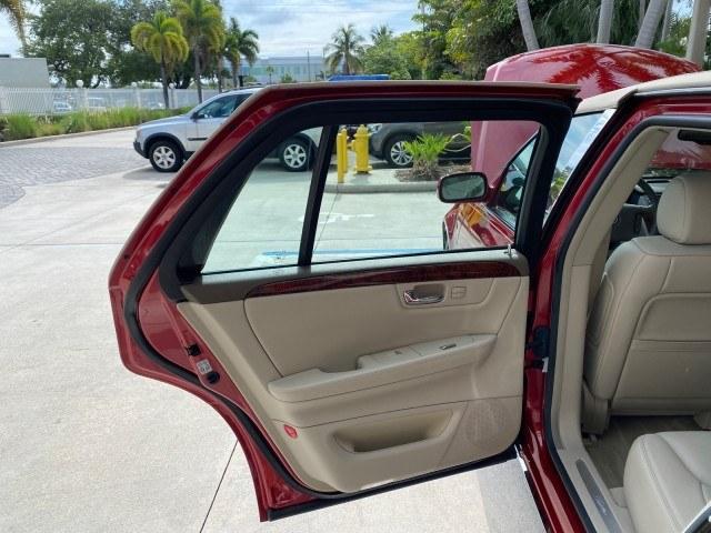 2006 Crimson Pearl /Shale Cadillac DTS w/1SC LOW MILES 49863 SUNROOF PEARL RED (1G6KD57Y26U) with an 4.6L DOHC V8 Northstar Engine engine, Automatic transmission, located at 4701 North Dixie Hwy, Pompano Beach, FL, 33064, (954) 422-2889, 26.240938, -80.123474 - OUR WEBPAGE FLORIDACARS1.COM HAS OVER 100 PHOTOS AND FREE CARFAX LINK 2006 Cadillac DTS Luxury Sedan 4 DR 4.6L V8 F Gasoline 25 MPG Front Wheel Drive Features A/C Seat(s) ABS Brakes Air Conditioning Alloy Wheels AM/FM Stereo Automatic Transmission Auxiliary Audio Input Bluetooth Technology CD Audio- Photo#13