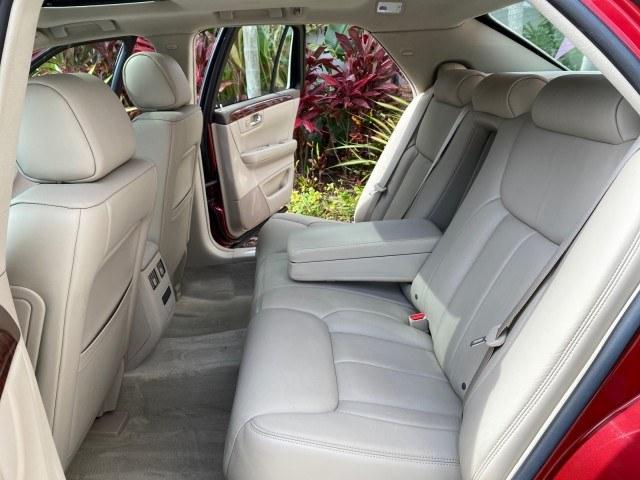 2006 Crimson Pearl /Shale Cadillac DTS w/1SC LOW MILES 49863 SUNROOF PEARL RED (1G6KD57Y26U) with an 4.6L DOHC V8 Northstar Engine engine, Automatic transmission, located at 4701 North Dixie Hwy, Pompano Beach, FL, 33064, (954) 422-2889, 26.240938, -80.123474 - OUR WEBPAGE FLORIDACARS1.COM HAS OVER 100 PHOTOS AND FREE CARFAX LINK 2006 Cadillac DTS Luxury Sedan 4 DR 4.6L V8 F Gasoline 25 MPG Front Wheel Drive Features A/C Seat(s) ABS Brakes Air Conditioning Alloy Wheels AM/FM Stereo Automatic Transmission Auxiliary Audio Input Bluetooth Technology CD Audio- Photo#14
