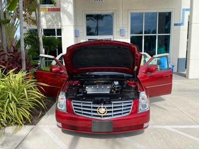 2006 Crimson Pearl /Shale Cadillac DTS w/1SC LOW MILES 49863 SUNROOF PEARL RED (1G6KD57Y26U) with an 4.6L DOHC V8 Northstar Engine engine, Automatic transmission, located at 4701 North Dixie Hwy, Pompano Beach, FL, 33064, (954) 422-2889, 26.240938, -80.123474 - OUR WEBPAGE FLORIDACARS1.COM HAS OVER 100 PHOTOS AND FREE CARFAX LINK 2006 Cadillac DTS Luxury Sedan 4 DR 4.6L V8 F Gasoline 25 MPG Front Wheel Drive Features A/C Seat(s) ABS Brakes Air Conditioning Alloy Wheels AM/FM Stereo Automatic Transmission Auxiliary Audio Input Bluetooth Technology CD Audio- Photo#16