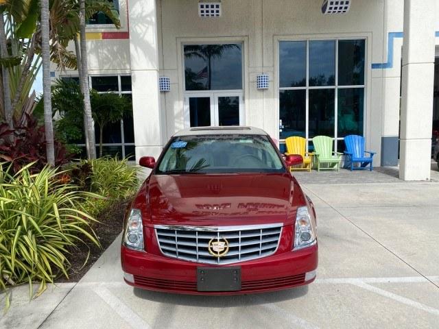 2006 Crimson Pearl /Shale Cadillac DTS w/1SC LOW MILES 49863 SUNROOF PEARL RED (1G6KD57Y26U) with an 4.6L DOHC V8 Northstar Engine engine, Automatic transmission, located at 4701 North Dixie Hwy, Pompano Beach, FL, 33064, (954) 422-2889, 26.240938, -80.123474 - OUR WEBPAGE FLORIDACARS1.COM HAS OVER 100 PHOTOS AND FREE CARFAX LINK 2006 Cadillac DTS Luxury Sedan 4 DR 4.6L V8 F Gasoline 25 MPG Front Wheel Drive Features A/C Seat(s) ABS Brakes Air Conditioning Alloy Wheels AM/FM Stereo Automatic Transmission Auxiliary Audio Input Bluetooth Technology CD Audio- Photo#26
