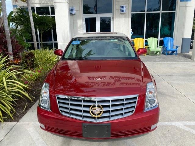 2006 Crimson Pearl /Shale Cadillac DTS w/1SC LOW MILES 49863 SUNROOF PEARL RED (1G6KD57Y26U) with an 4.6L DOHC V8 Northstar Engine engine, Automatic transmission, located at 4701 North Dixie Hwy, Pompano Beach, FL, 33064, (954) 422-2889, 26.240938, -80.123474 - OUR WEBPAGE FLORIDACARS1.COM HAS OVER 100 PHOTOS AND FREE CARFAX LINK 2006 Cadillac DTS Luxury Sedan 4 DR 4.6L V8 F Gasoline 25 MPG Front Wheel Drive Features A/C Seat(s) ABS Brakes Air Conditioning Alloy Wheels AM/FM Stereo Automatic Transmission Auxiliary Audio Input Bluetooth Technology CD Audio- Photo#27
