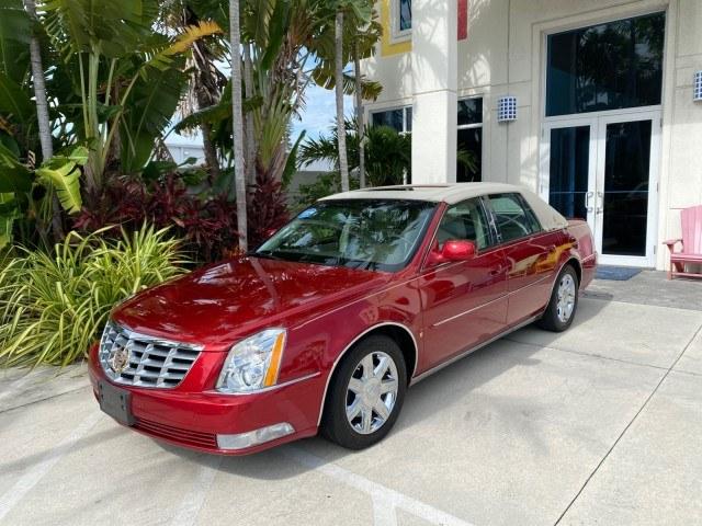 2006 Crimson Pearl /Shale Cadillac DTS w/1SC LOW MILES 49863 SUNROOF PEARL RED (1G6KD57Y26U) with an 4.6L DOHC V8 Northstar Engine engine, Automatic transmission, located at 4701 North Dixie Hwy, Pompano Beach, FL, 33064, (954) 422-2889, 26.240938, -80.123474 - OUR WEBPAGE FLORIDACARS1.COM HAS OVER 100 PHOTOS AND FREE CARFAX LINK 2006 Cadillac DTS Luxury Sedan 4 DR 4.6L V8 F Gasoline 25 MPG Front Wheel Drive Features A/C Seat(s) ABS Brakes Air Conditioning Alloy Wheels AM/FM Stereo Automatic Transmission Auxiliary Audio Input Bluetooth Technology CD Audio- Photo#28