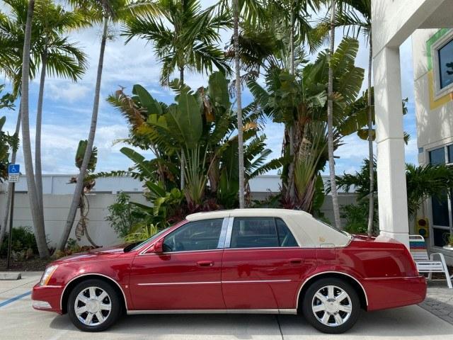 2006 Crimson Pearl /Shale Cadillac DTS w/1SC LOW MILES 49863 SUNROOF PEARL RED (1G6KD57Y26U) with an 4.6L DOHC V8 Northstar Engine engine, Automatic transmission, located at 4701 North Dixie Hwy, Pompano Beach, FL, 33064, (954) 422-2889, 26.240938, -80.123474 - OUR WEBPAGE FLORIDACARS1.COM HAS OVER 100 PHOTOS AND FREE CARFAX LINK 2006 Cadillac DTS Luxury Sedan 4 DR 4.6L V8 F Gasoline 25 MPG Front Wheel Drive Features A/C Seat(s) ABS Brakes Air Conditioning Alloy Wheels AM/FM Stereo Automatic Transmission Auxiliary Audio Input Bluetooth Technology CD Audio- Photo#30