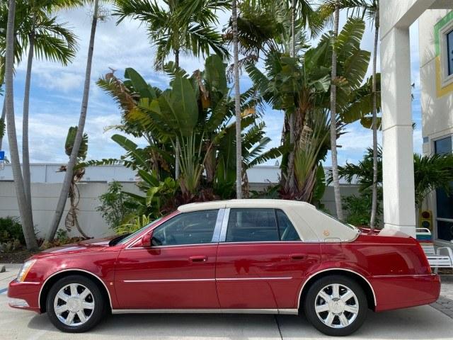 2006 Crimson Pearl /Shale Cadillac DTS w/1SC LOW MILES 49863 SUNROOF PEARL RED (1G6KD57Y26U) with an 4.6L DOHC V8 Northstar Engine engine, Automatic transmission, located at 4701 North Dixie Hwy, Pompano Beach, FL, 33064, (954) 422-2889, 26.240938, -80.123474 - OUR WEBPAGE FLORIDACARS1.COM HAS OVER 100 PHOTOS AND FREE CARFAX LINK 2006 Cadillac DTS Luxury Sedan 4 DR 4.6L V8 F Gasoline 25 MPG Front Wheel Drive Features A/C Seat(s) ABS Brakes Air Conditioning Alloy Wheels AM/FM Stereo Automatic Transmission Auxiliary Audio Input Bluetooth Technology CD Audio- Photo#31