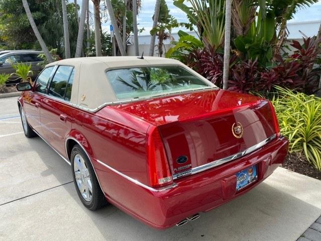 2006 Crimson Pearl /Shale Cadillac DTS w/1SC LOW MILES 49863 SUNROOF PEARL RED (1G6KD57Y26U) with an 4.6L DOHC V8 Northstar Engine engine, Automatic transmission, located at 4701 North Dixie Hwy, Pompano Beach, FL, 33064, (954) 422-2889, 26.240938, -80.123474 - OUR WEBPAGE FLORIDACARS1.COM HAS OVER 100 PHOTOS AND FREE CARFAX LINK 2006 Cadillac DTS Luxury Sedan 4 DR 4.6L V8 F Gasoline 25 MPG Front Wheel Drive Features A/C Seat(s) ABS Brakes Air Conditioning Alloy Wheels AM/FM Stereo Automatic Transmission Auxiliary Audio Input Bluetooth Technology CD Audio- Photo#33