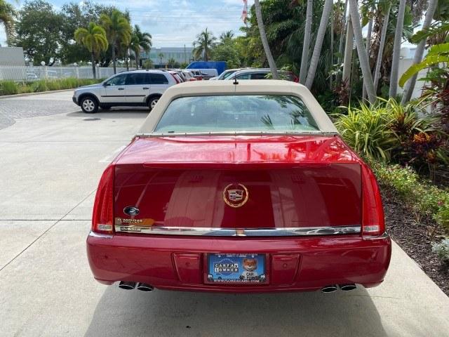 2006 Crimson Pearl /Shale Cadillac DTS w/1SC LOW MILES 49863 SUNROOF PEARL RED (1G6KD57Y26U) with an 4.6L DOHC V8 Northstar Engine engine, Automatic transmission, located at 4701 North Dixie Hwy, Pompano Beach, FL, 33064, (954) 422-2889, 26.240938, -80.123474 - OUR WEBPAGE FLORIDACARS1.COM HAS OVER 100 PHOTOS AND FREE CARFAX LINK 2006 Cadillac DTS Luxury Sedan 4 DR 4.6L V8 F Gasoline 25 MPG Front Wheel Drive Features A/C Seat(s) ABS Brakes Air Conditioning Alloy Wheels AM/FM Stereo Automatic Transmission Auxiliary Audio Input Bluetooth Technology CD Audio- Photo#34