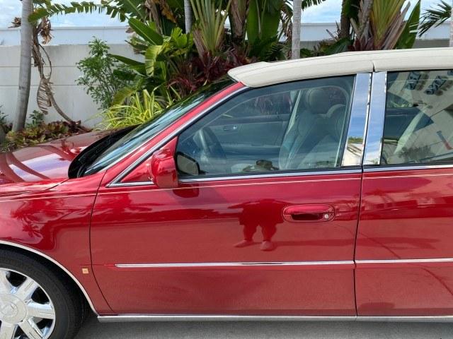2006 Crimson Pearl /Shale Cadillac DTS w/1SC LOW MILES 49863 SUNROOF PEARL RED (1G6KD57Y26U) with an 4.6L DOHC V8 Northstar Engine engine, Automatic transmission, located at 4701 North Dixie Hwy, Pompano Beach, FL, 33064, (954) 422-2889, 26.240938, -80.123474 - OUR WEBPAGE FLORIDACARS1.COM HAS OVER 100 PHOTOS AND FREE CARFAX LINK 2006 Cadillac DTS Luxury Sedan 4 DR 4.6L V8 F Gasoline 25 MPG Front Wheel Drive Features A/C Seat(s) ABS Brakes Air Conditioning Alloy Wheels AM/FM Stereo Automatic Transmission Auxiliary Audio Input Bluetooth Technology CD Audio- Photo#36