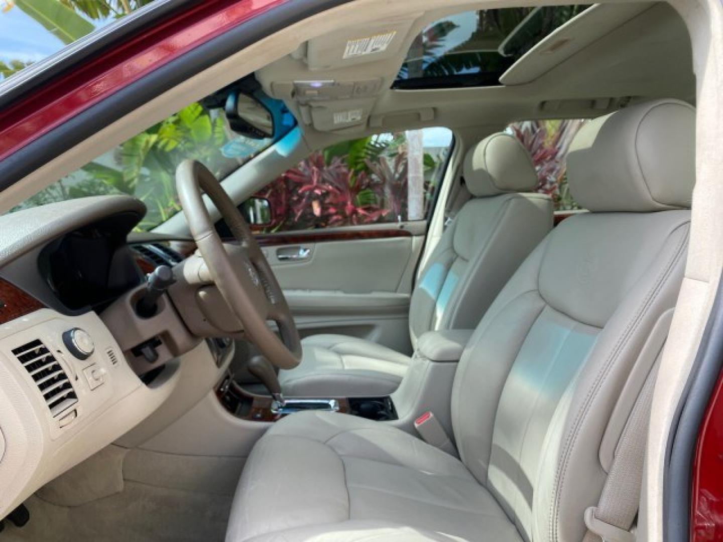 2006 Crimson Pearl /Shale Cadillac DTS w/1SC LOW MILES 49863 SUNROOF PEARL RED (1G6KD57Y26U) with an 4.6L DOHC V8 Northstar Engine engine, Automatic transmission, located at 4701 North Dixie Hwy, Pompano Beach, FL, 33064, (954) 422-2889, 26.240938, -80.123474 - OUR WEBPAGE FLORIDACARS1.COM HAS OVER 100 PHOTOS AND FREE CARFAX LINK 2006 Cadillac DTS Luxury Sedan 4 DR 4.6L V8 F Gasoline 25 MPG Front Wheel Drive Features A/C Seat(s) ABS Brakes Air Conditioning Alloy Wheels AM/FM Stereo Automatic Transmission Auxiliary Audio Input Bluetooth Technology CD Audio- Photo#44