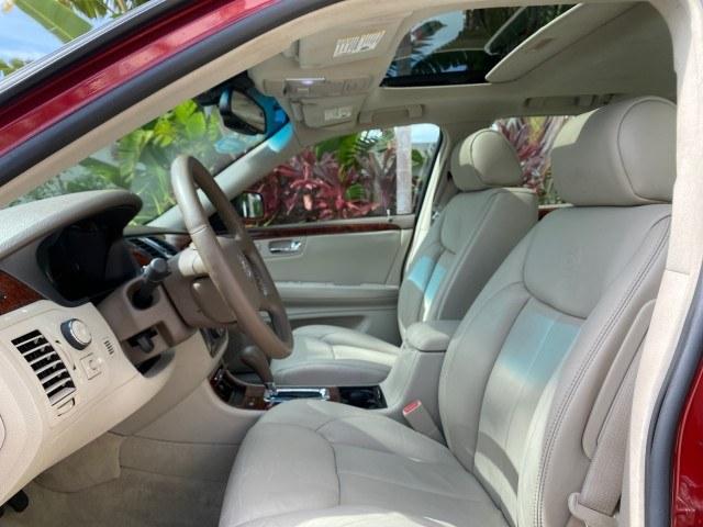 2006 Crimson Pearl /Shale Cadillac DTS w/1SC LOW MILES 49863 SUNROOF PEARL RED (1G6KD57Y26U) with an 4.6L DOHC V8 Northstar Engine engine, Automatic transmission, located at 4701 North Dixie Hwy, Pompano Beach, FL, 33064, (954) 422-2889, 26.240938, -80.123474 - OUR WEBPAGE FLORIDACARS1.COM HAS OVER 100 PHOTOS AND FREE CARFAX LINK 2006 Cadillac DTS Luxury Sedan 4 DR 4.6L V8 F Gasoline 25 MPG Front Wheel Drive Features A/C Seat(s) ABS Brakes Air Conditioning Alloy Wheels AM/FM Stereo Automatic Transmission Auxiliary Audio Input Bluetooth Technology CD Audio- Photo#44