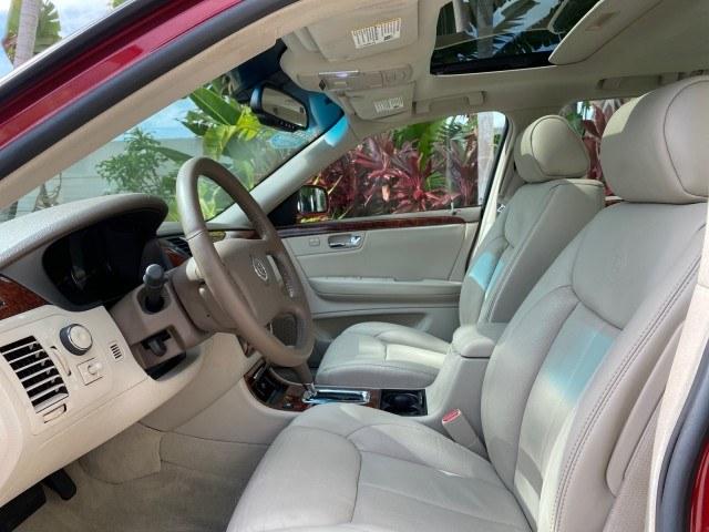 2006 Crimson Pearl /Shale Cadillac DTS w/1SC LOW MILES 49863 SUNROOF PEARL RED (1G6KD57Y26U) with an 4.6L DOHC V8 Northstar Engine engine, Automatic transmission, located at 4701 North Dixie Hwy, Pompano Beach, FL, 33064, (954) 422-2889, 26.240938, -80.123474 - OUR WEBPAGE FLORIDACARS1.COM HAS OVER 100 PHOTOS AND FREE CARFAX LINK 2006 Cadillac DTS Luxury Sedan 4 DR 4.6L V8 F Gasoline 25 MPG Front Wheel Drive Features A/C Seat(s) ABS Brakes Air Conditioning Alloy Wheels AM/FM Stereo Automatic Transmission Auxiliary Audio Input Bluetooth Technology CD Audio- Photo#45