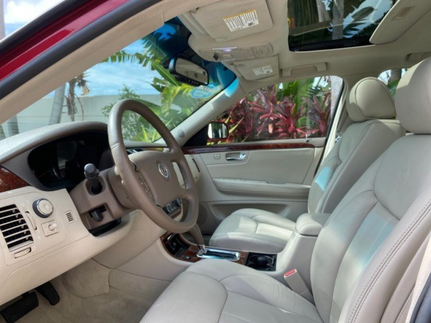 2006 Crimson Pearl /Shale Cadillac DTS w/1SC LOW MILES 49863 SUNROOF PEARL RED (1G6KD57Y26U) with an 4.6L DOHC V8 Northstar Engine engine, Automatic transmission, located at 4701 North Dixie Hwy, Pompano Beach, FL, 33064, (954) 422-2889, 26.240938, -80.123474 - OUR WEBPAGE FLORIDACARS1.COM HAS OVER 100 PHOTOS AND FREE CARFAX LINK 2006 Cadillac DTS Luxury Sedan 4 DR 4.6L V8 F Gasoline 25 MPG Front Wheel Drive Features A/C Seat(s) ABS Brakes Air Conditioning Alloy Wheels AM/FM Stereo Automatic Transmission Auxiliary Audio Input Bluetooth Technology CD Audio- Photo#46