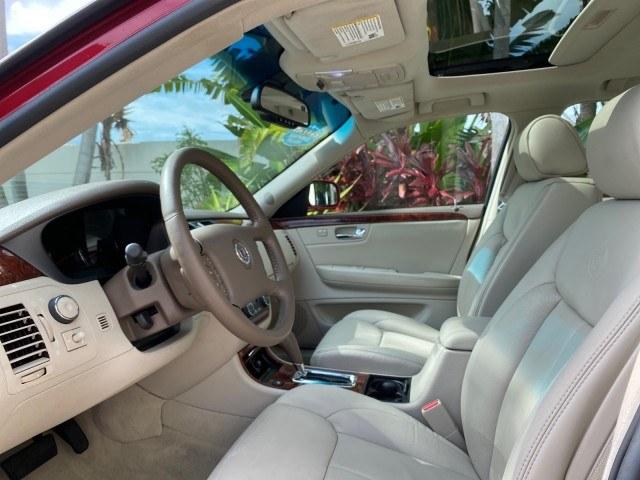 2006 Crimson Pearl /Shale Cadillac DTS w/1SC LOW MILES 49863 SUNROOF PEARL RED (1G6KD57Y26U) with an 4.6L DOHC V8 Northstar Engine engine, Automatic transmission, located at 4701 North Dixie Hwy, Pompano Beach, FL, 33064, (954) 422-2889, 26.240938, -80.123474 - OUR WEBPAGE FLORIDACARS1.COM HAS OVER 100 PHOTOS AND FREE CARFAX LINK 2006 Cadillac DTS Luxury Sedan 4 DR 4.6L V8 F Gasoline 25 MPG Front Wheel Drive Features A/C Seat(s) ABS Brakes Air Conditioning Alloy Wheels AM/FM Stereo Automatic Transmission Auxiliary Audio Input Bluetooth Technology CD Audio- Photo#46