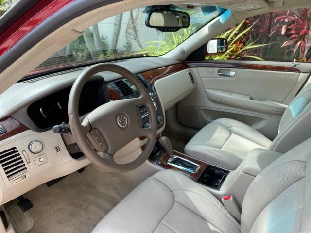 2006 Crimson Pearl /Shale Cadillac DTS w/1SC LOW MILES 49863 SUNROOF PEARL RED (1G6KD57Y26U) with an 4.6L DOHC V8 Northstar Engine engine, Automatic transmission, located at 4701 North Dixie Hwy, Pompano Beach, FL, 33064, (954) 422-2889, 26.240938, -80.123474 - OUR WEBPAGE FLORIDACARS1.COM HAS OVER 100 PHOTOS AND FREE CARFAX LINK 2006 Cadillac DTS Luxury Sedan 4 DR 4.6L V8 F Gasoline 25 MPG Front Wheel Drive Features A/C Seat(s) ABS Brakes Air Conditioning Alloy Wheels AM/FM Stereo Automatic Transmission Auxiliary Audio Input Bluetooth Technology CD Audio- Photo#47