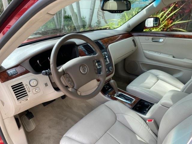 2006 Crimson Pearl /Shale Cadillac DTS w/1SC LOW MILES 49863 SUNROOF PEARL RED (1G6KD57Y26U) with an 4.6L DOHC V8 Northstar Engine engine, Automatic transmission, located at 4701 North Dixie Hwy, Pompano Beach, FL, 33064, (954) 422-2889, 26.240938, -80.123474 - OUR WEBPAGE FLORIDACARS1.COM HAS OVER 100 PHOTOS AND FREE CARFAX LINK 2006 Cadillac DTS Luxury Sedan 4 DR 4.6L V8 F Gasoline 25 MPG Front Wheel Drive Features A/C Seat(s) ABS Brakes Air Conditioning Alloy Wheels AM/FM Stereo Automatic Transmission Auxiliary Audio Input Bluetooth Technology CD Audio- Photo#48
