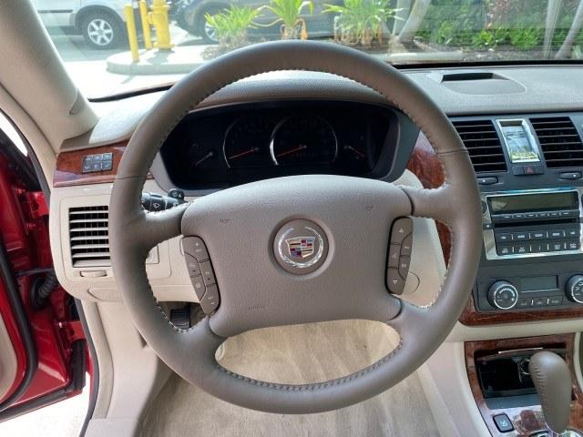 2006 Crimson Pearl /Shale Cadillac DTS w/1SC LOW MILES 49863 SUNROOF PEARL RED (1G6KD57Y26U) with an 4.6L DOHC V8 Northstar Engine engine, Automatic transmission, located at 4701 North Dixie Hwy, Pompano Beach, FL, 33064, (954) 422-2889, 26.240938, -80.123474 - OUR WEBPAGE FLORIDACARS1.COM HAS OVER 100 PHOTOS AND FREE CARFAX LINK 2006 Cadillac DTS Luxury Sedan 4 DR 4.6L V8 F Gasoline 25 MPG Front Wheel Drive Features A/C Seat(s) ABS Brakes Air Conditioning Alloy Wheels AM/FM Stereo Automatic Transmission Auxiliary Audio Input Bluetooth Technology CD Audio- Photo#50